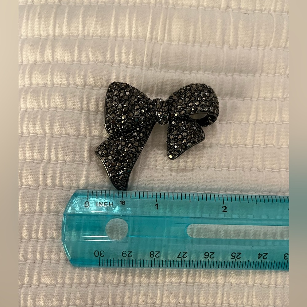 Talbots pace black stones bow pin.